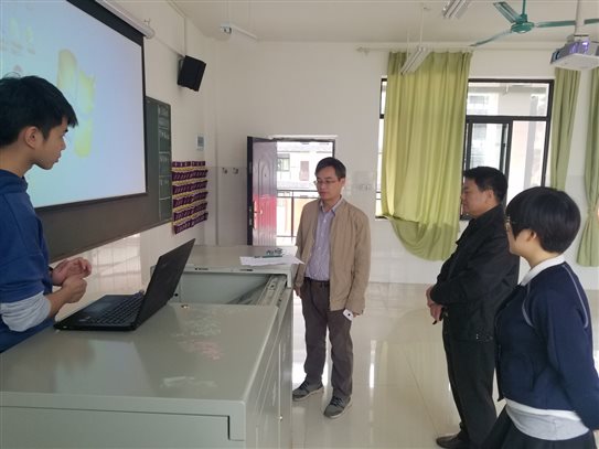 c:usersadministratordesktop广西商贸新闻稿多媒体设备明阳校区验收80315_103044.jpg